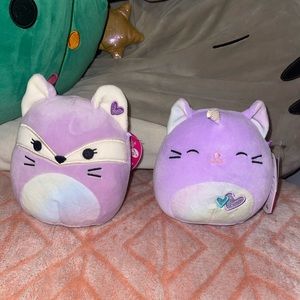 2 purple squishmallows